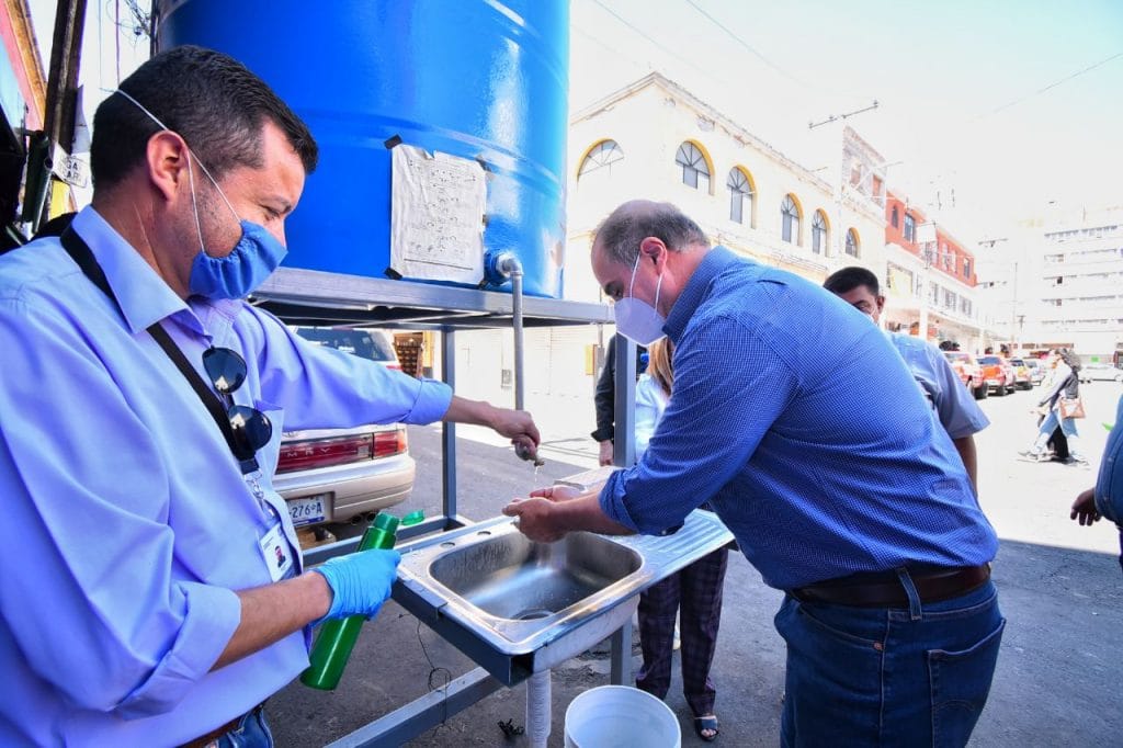 COMUNICADO LAVAMANOS EN MERCADO 1